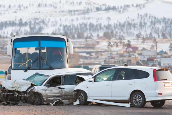 An image of a multi car accident caused by a bus